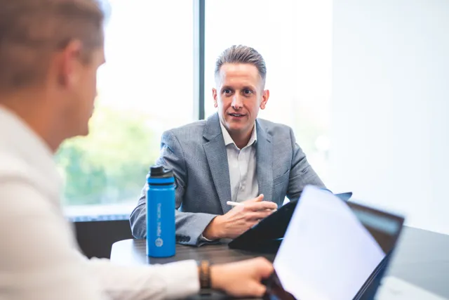 A PGH Networks consultant meeting with a client