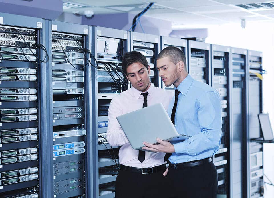 MSP Professionals Collaborating in Server Room