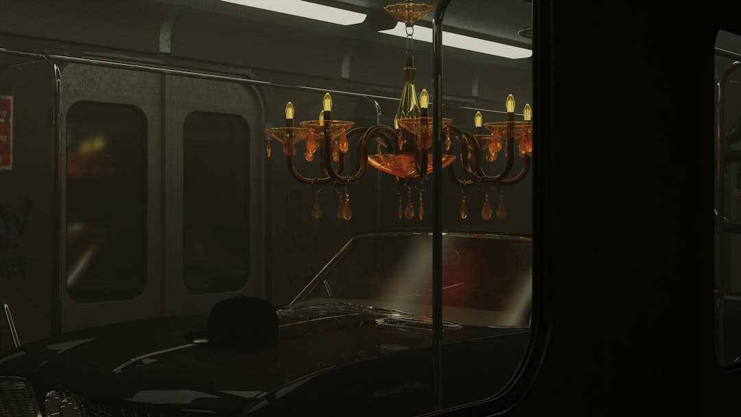 a train car with a chandelier hanging from the ceiling